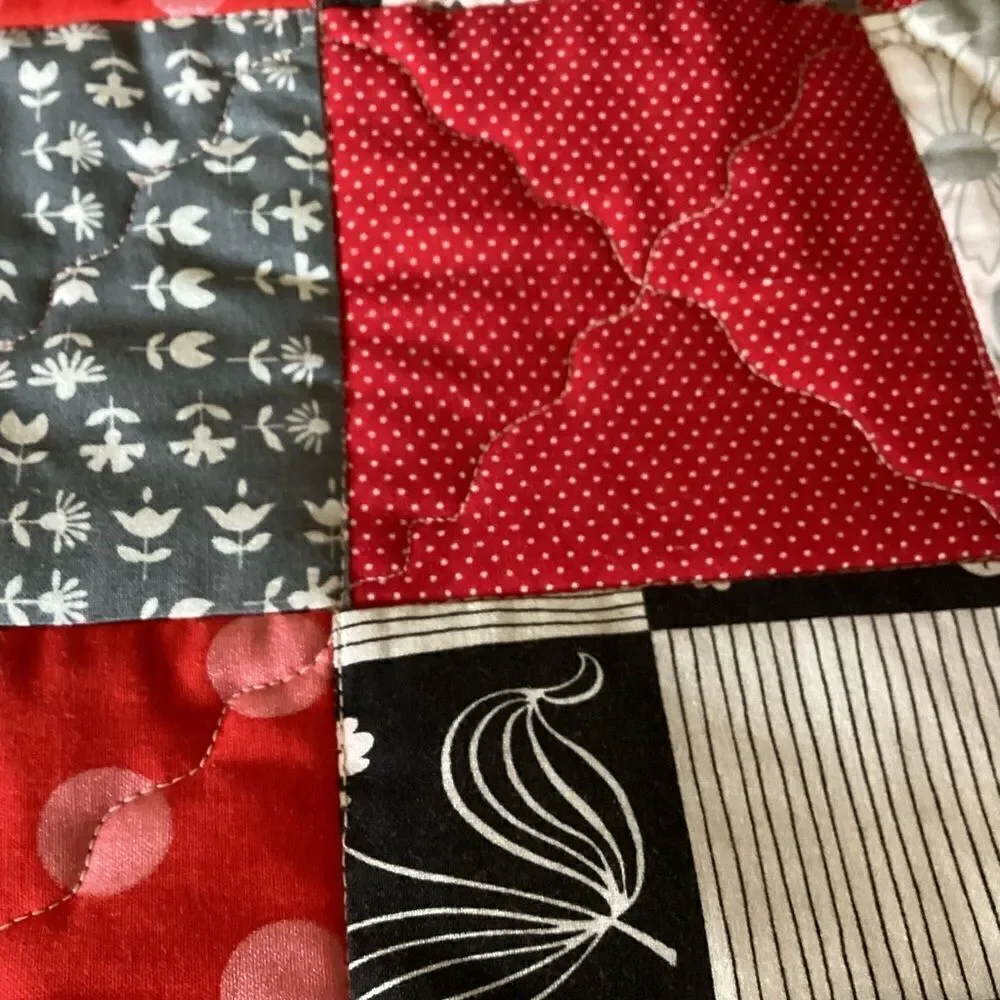 NWT , quilted reversible, handcrafted, baby bib reds